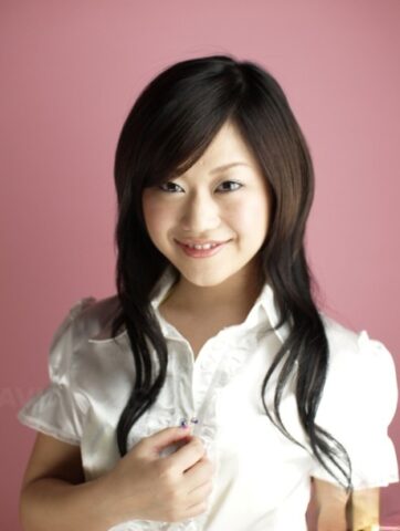 Cute Japanese model Minako Oyama poses non nude in a blouse and skirt