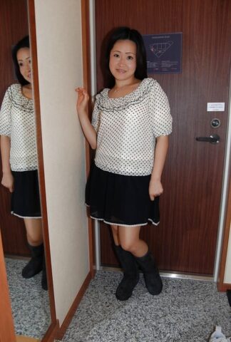 Splendid Asian brunette Takako Makino is a frisky milf with hairy cunt
