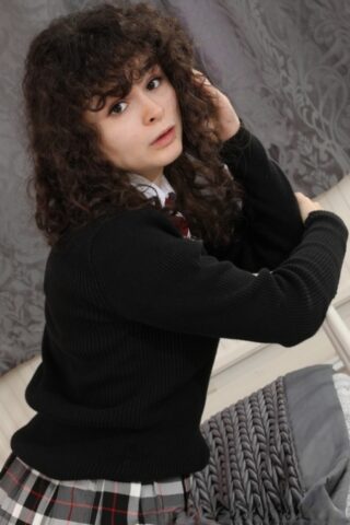 Brunette student Karen Holster goes topless after an upskirt panty flash
