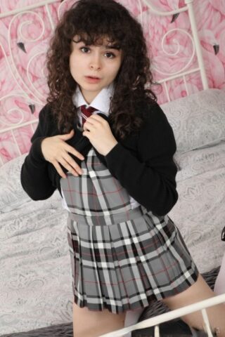 Brunette student Karen Holster goes topless after an upskirt panty flash