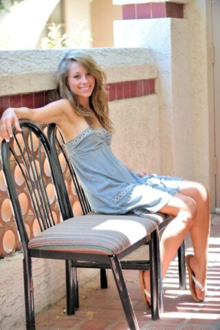 Gorgeous teen Rilee flashes her tits before stripping her dress in public