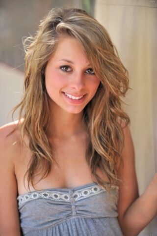 Gorgeous teen Rilee flashes her tits before stripping her dress in public