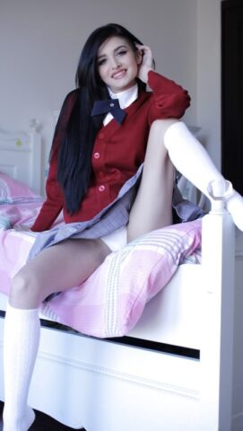 Naughty teen in school uniform Zoey Kush uncovering her tiny tits