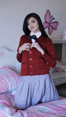 Naughty teen in school uniform Zoey Kush uncovering her tiny tits