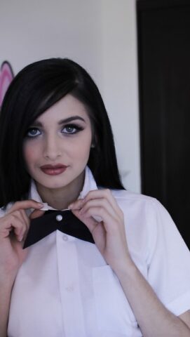 Naughty teen in school uniform Zoey Kush uncovering her tiny tits