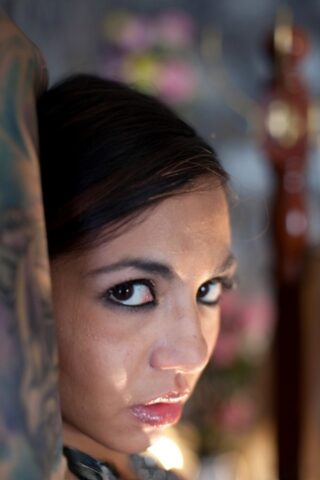 Tattooed brunette chick Holly D teasing her mans big dick in erotic fashion