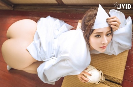 44585779_010_bcd8-1 Beautiful Asian girl strikes stunning poses showing her big boobs