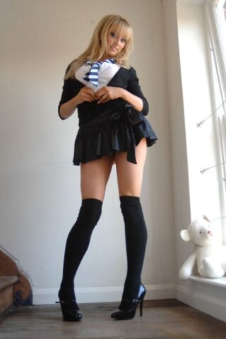 Adorable babe in black socks Elle Parker taking off her school uniform