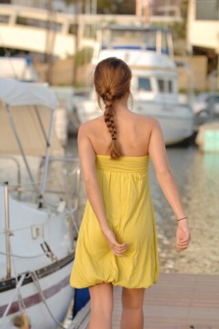 Cute amateur Andrea shows her beautiful bosom and poses nude in public