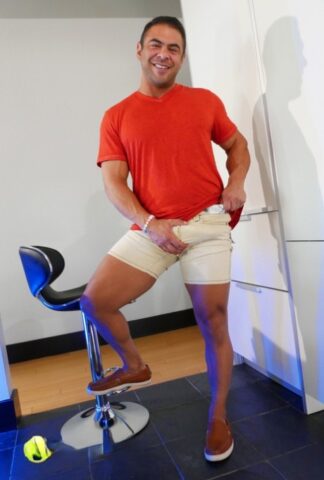Muscular gay brunette Draven Navarro reveals his big penis and tight ass