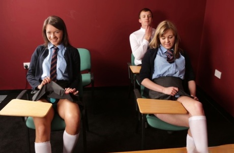 UK coeds Savannah Secret & Nadia Elaina give a fellow student a CFNM blowjob