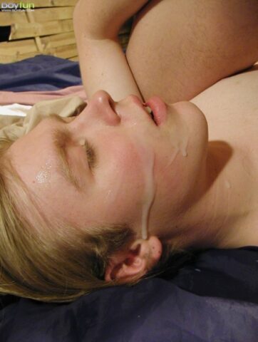 Blonde twink takes a facial after giving a hot blowjob outdoors