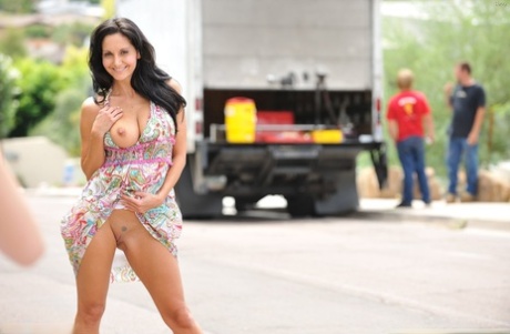 Adorable MILF Ava Addams exposes her big juggs and fantastic ass outdoors