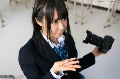 73607410_016_16a9 Japanese schoolgirl puts down her camera long enough to suck off her teacher