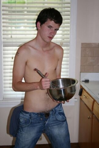 Naughty gay Devin Moss strips naked & jerks his big dick while baking