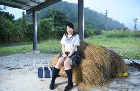 Japanese schoolgirl Shiho Nagamine gets her hairy pussy pounded deeply