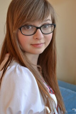 76304817_009_de34 Adorable schoolgirl in glasses Lilah Demaray fingers & toys her chubby pussy