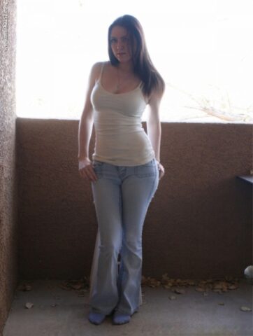 American brunette Megan Loxx reveals her fabulous butt and small tits
