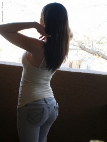 American brunette Megan Loxx reveals her fabulous butt and small tits