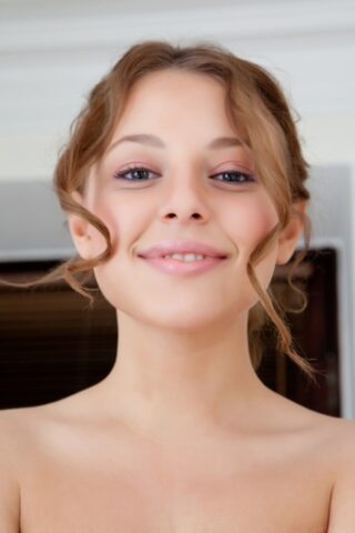 Glam teen Nikia A showing off her beautiful naked body in the bathroom