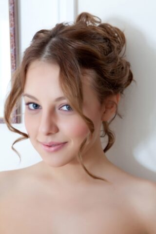 Glam teen Nikia A showing off her beautiful naked body in the bathroom