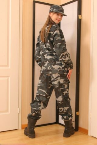 Petite military lady Tina unveils her trimmed pussy in a sexy striptease