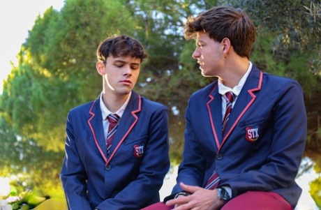 Caucasian students remove their uniforms during their first gay sex experience
