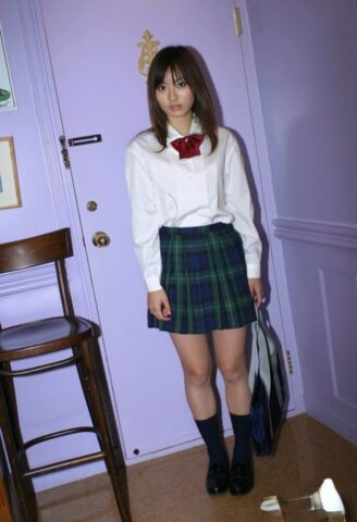 Naughty asian schoolgirl Hikaru Koto slipping off her uniform