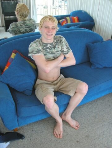 Horny gay blonde Jarrod plays with his uncut dick on the beach and at home