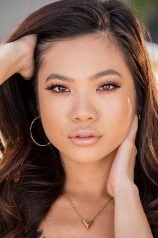 Asian teen Vina Sky doffs sexy lingerie on a patio before riding a huge penis
