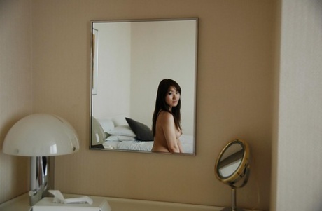 73375200_008_a20f Asian babe exposing her honey pot in close up and vibing her clit