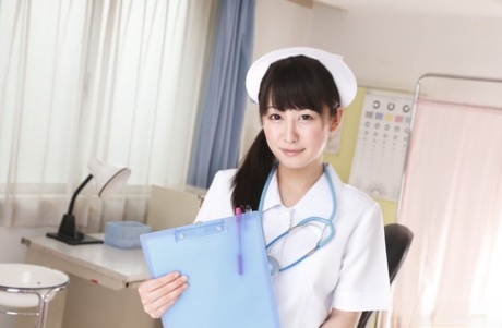 84170135_001_5bca Japanese nurse Ayumi Iwasa shows her tits and pussy during a solo show