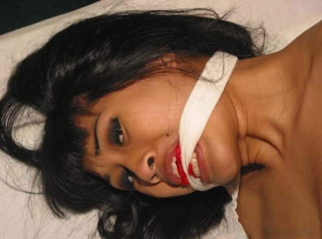 48086896_012_72ff Ethnic girl ends up naked while cleave gagged and hogtied on a bed
