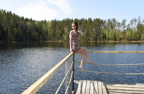 75893059_003_3209 Glamorous teen Pala strips to show her very skinny body by the lake